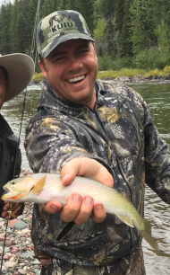 Eddie holding a fish